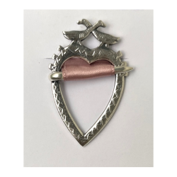 Heart-shaped silver brooch